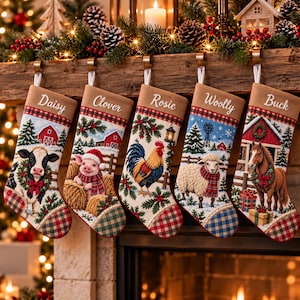 May include: Five personalized Christmas stockings hanging in a row, each featuring a tan cuff with names Daisy, Clover, Rosie, Woolly, and Buck. The stockings display farm animal illustrations including a cow, pig, rooster, sheep, and horse.