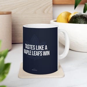 Tastes Like A Toronto Maple Leafs Win | 11oz - 15oz Ceramic Mug | Lucky Ice Hockey Victory Game Day Gift For Dad, Club Sports Fan Cup