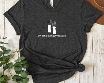 My Cat's Deadly Weapon Shirt, Funny Kitty Shirt, Naughty Cat Tshirt, Cat Meme Shirt, Animal Lover Shirt, Pet Parent Humor, Feline Friend