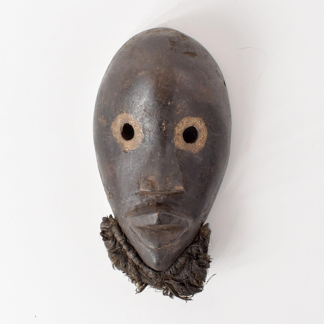 ダン族　old passport mask Dan Passport Mask With Raffia Liberia - Etsy