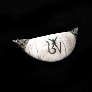 Colgante tibetano sagrado de concha de Chank