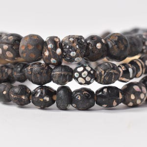 Skunk Venetian Excavated Black Trade Beads