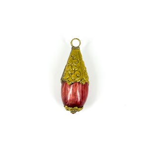 Tibetan Red Brass Repousse Pendant