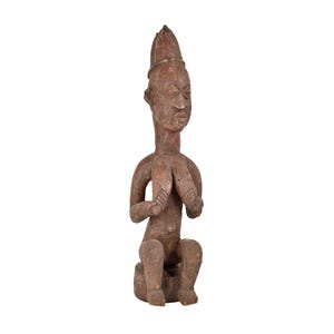 Yoruba Female Lifting Breasts Figure Nigeria