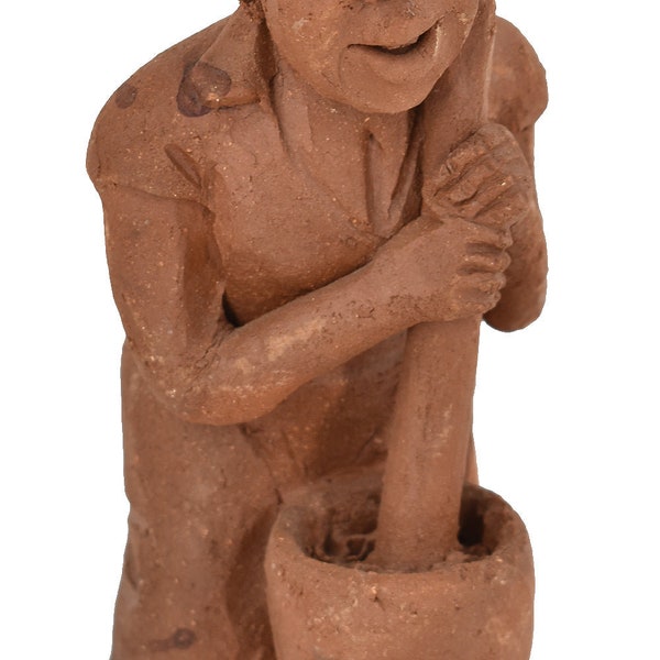 Female Clay Figure Grinding Maize Malawi