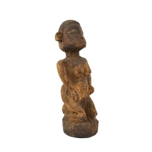 Figurine yoruba agenouillée Nigéria