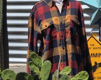 "Jag matchar energin, så hur ska vi agera idag?" - Röd och orange flanell (RSQ)