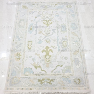 Cream Oushak Wool Rug 9x12: Hand-Knotted Floral Design