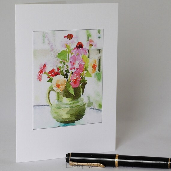 Green Pitcher with Assorted Flowers