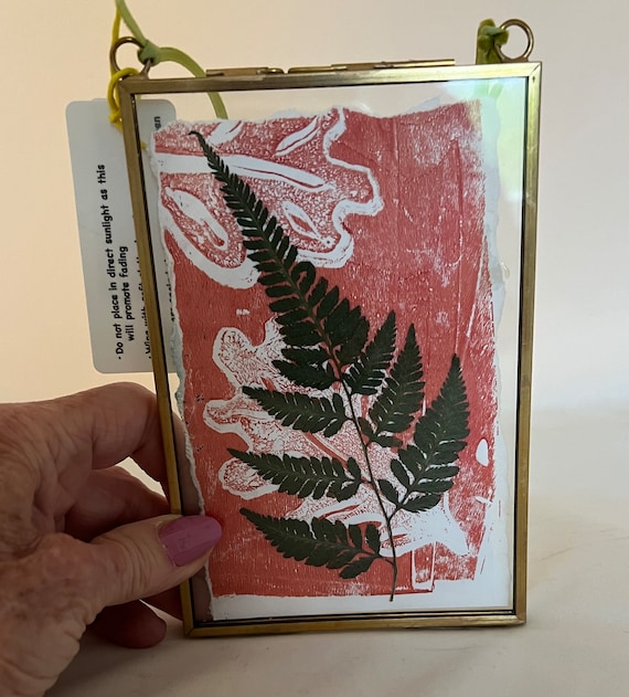 PRESSED FERN, handprinted paper, green fern on rosy background, torn edge paper, darkgreen fern