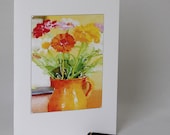 Orange Pitcher with Assorted Flowers