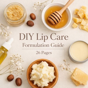 May include: A flat lay image featuring ingredients for DIY lip care. Includes a jar of scrub, honey with a dipper, shea butter, nuts, and a bottle of oil. The text reads "DIY Lip Care Formulation Guide 26 Pages."