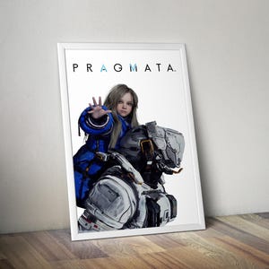 May include: A framed poster featuring the Pragmata logo at the top. The artwork displays a young person with long blonde hair wearing a bright blue jacket, reaching out with one hand while positioned behind a large, detailed white and gray robot.