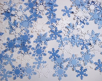 Blue snowflake confetti punches for Christmas party decorations, scrapbook embellishments