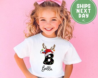 Camiseta navideña personalizada con monograma a juego, camiseta navideña con gorro de Papá Noel, camiseta infantil con nombre personalizado y alfabeto de reno, camiseta navideña familiar