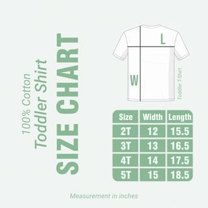 May include: White toddler t-shirt size chart with measurements in inches. The chart includes sizes 2T to 5T, with corresponding width and length measurements. The text "100% Cotton Toddler Shirt" is also present.