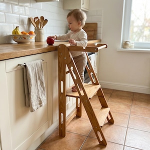 May include: A set of three ceramic mugs with a speckled, matte finish. The mugs are in shades of cream, light gray, and dark gray. Each mug has a simple, minimalist design, perfect for coffee or tea.