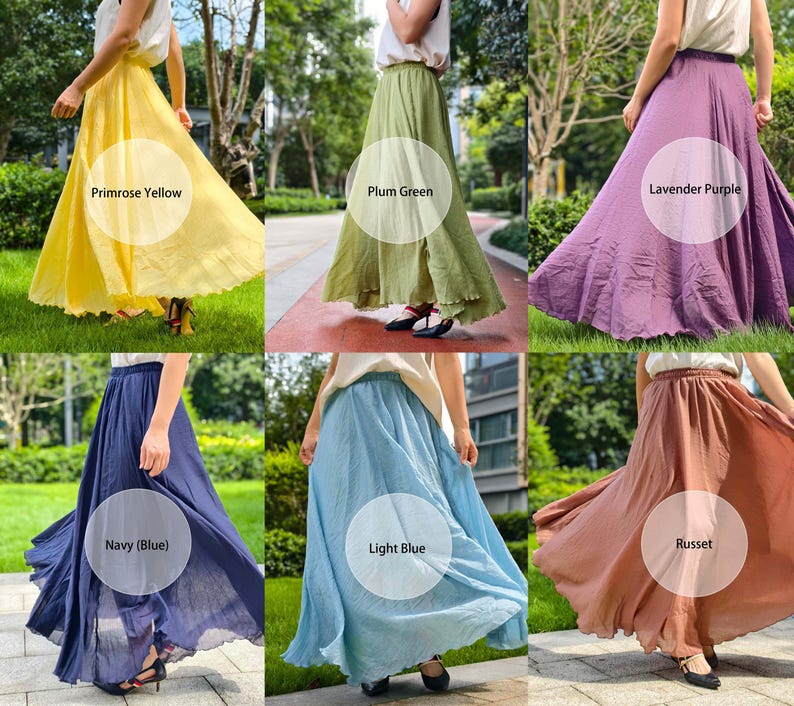 May include: A collection of six long, flowing skirts in primrose yellow, plum green, lavender purple, navy blue, light blue, and russet. Each skirt features a high-waisted design with a gathered, voluminous silhouette that reaches the ankles.