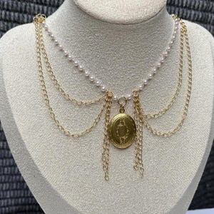 Romantic, fairy-tale inspired gold locket necklace with chain and pearls