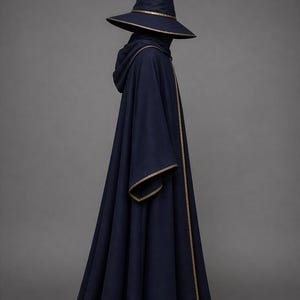 May include: A navy blue wizard costume featuring a pointed hat with a gold trim and a matching hooded robe. The robe has gold trim along the edges and sleeves, creating a classic fantasy look.