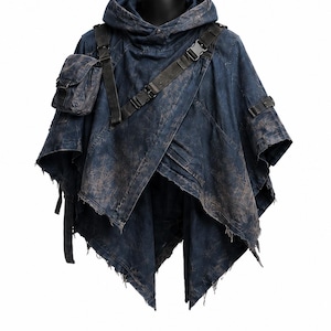 May include: A distressed navy blue hooded poncho with a unique asymmetrical design. Features a small shoulder bag, black straps, and buckle closures. The fabric has a worn, textured appearance with brown accents, and the edges are frayed.