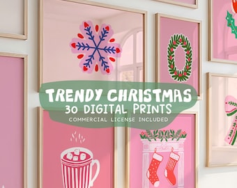 May include: A collection of framed digital prints with a Christmas theme. The prints feature festive illustrations in pink, green, and white, including a Christmas tree, snowflake, wreath, and a mug of hot cocoa. The text "TRENDY CHRISTMAS 30 DIGITAL PRINTS" is visible.