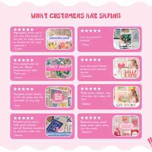 May include: A pink graphic display titled WHAT CUSTOMERS ARE SAYING featuring eight five-star reviews with customer testimonials and small thumbnail images of various art prints, including text like DOPAMINE DROP, BOOKISH, and JOLLY & CUTE.