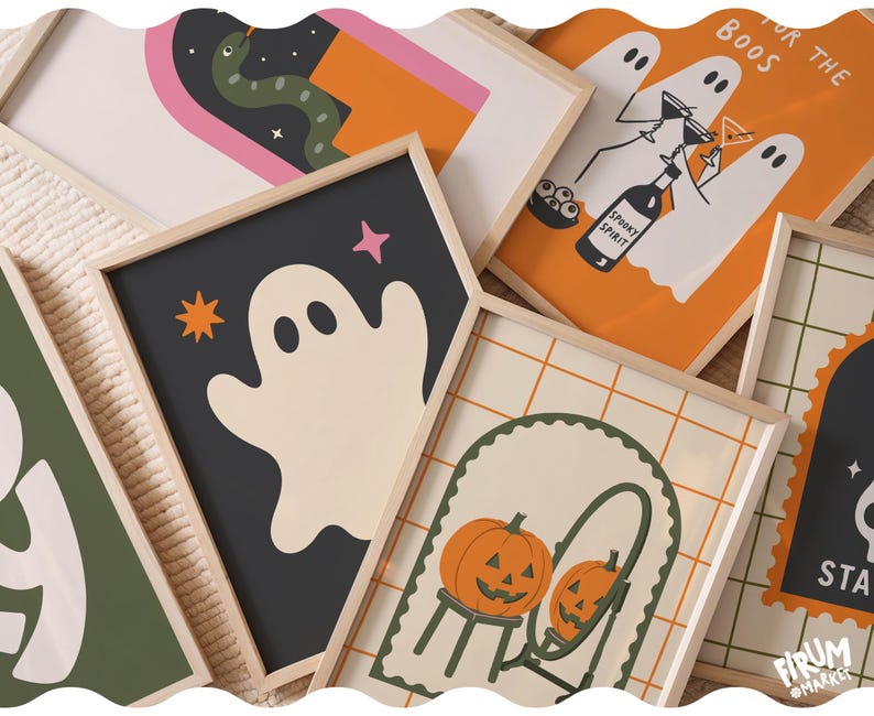 May include: A collection of framed art prints featuring Halloween-themed illustrations. Designs include ghosts, a snake, a pumpkin in a mirror, and text reading FOR THE BOOS, SPOOKY SPIRIT, and FIRUM MARKET. The prints are in light wooden frames.
