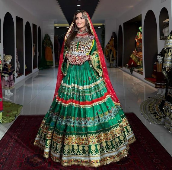 Vibrant Green Afghan Traditional Dress with Red and Gold Accents Vibrant Green Afghan Traditional Dress with Red and Gold Accents