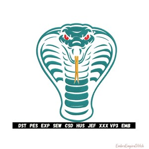 May include: A teal cobra head design with red eyes and a gold tongue, set against a white background. The design features a detailed, textured pattern. Below the cobra, a black bar displays embroidery file formats: DST PES EXP SEW CSD HUS JEF XXX VP3 EMB.