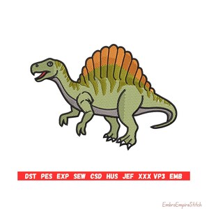 May include: An embroidered Spinosaurus dinosaur design in green, orange, and grey. The dinosaur has a large fin on its back and is smiling. The image includes the text "DST PES EXP SEW CSD HUS JEF XXX VP3 EMB" in a red banner.