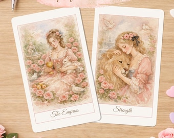 May include: Two rectangular tarot cards featuring soft-toned illustrations. The left card, labeled The Empress, depicts a person in a pink dress with a rabbit, a golden chalice, and white doves. The right card, labeled Strength, shows a person embracing a lion.