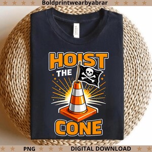 May include: Black t-shirt with a graphic of a traffic cone and a pirate flag, with the words "HOIST THE CONE" in orange and white. The design includes a skull and crossbones on the flag and orange rays emanating from the cone.