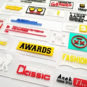 100 parches de PVC personalizados, parches de goma de PVC personalizados baratos con logotipo privado para coser en etiquetas de ropa, etiquetas de ropa ecológicas para jeans y bolsos.