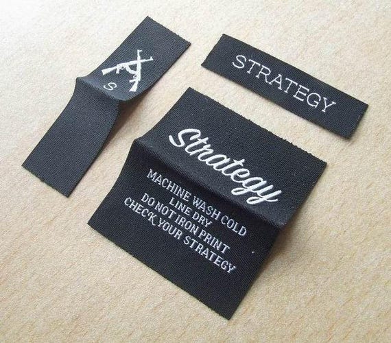 Custom New Design Top and Bottom Fold Green Color Based Garment Woven Label  for Clothes - China Garment Fabric Labels and Garment Custom Clothes Label  price