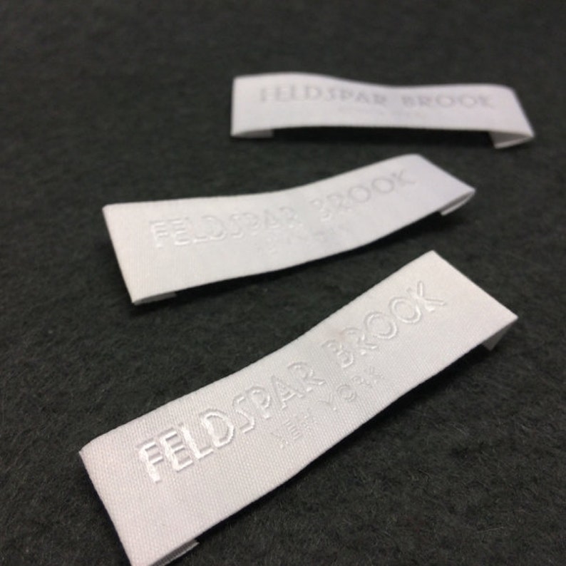 raised text woven label 50D 300 custom woven label embossed text high definition