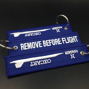 100 Flight Tags - Llaveros, llavero bordado