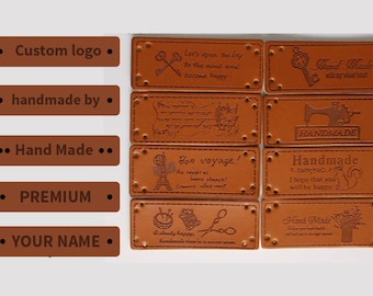 May include: Ten brown leather labels with different designs and text. The labels have stitching around the edges and small metal rivets. The text on the labels includes "Custom logo", "handmade by", "Hand Made", "PREMIUM", "YOUR NAME", "Let's open the key to the mind and become happy", "Bon voyage! Au revoir et bonne chance! Callez-moi", "Handmade I hope that you will be happy", "Hand Made with my heart", and "A slowly happy... handmade time in summer season."