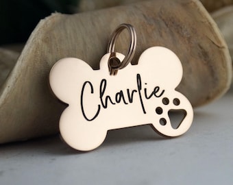 Personalized Rose Gold Dog ID Tag: Bone with Paw Print cutout