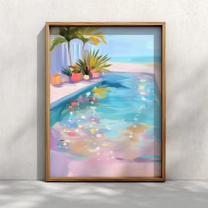 May include: A framed painting depicts a pool scene with a light blue sky and a beach in the background. The pool water is a mix of blues and pinks, with reflections of light. Palm trees and potted plants are visible.