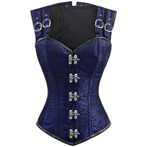 May include: A navy blue corset with a floral pattern. The corset has silver clasps down the front and adjustable straps with silver buckles. The top and bottom edges are trimmed with black fabric.