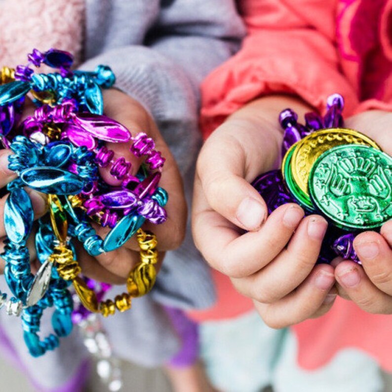 mardi gras beads and doubloons