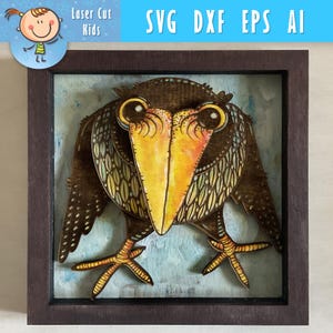 May include: A framed wooden artwork of a bird, featuring layered design. The bird has a yellow beak, large eyes, and detailed feather patterns. The background is light blue. Text at the top reads "SVG DXF EPS AI". The artwork is from "Laser Cut Kids".