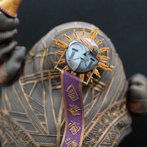 May include: A set of three ceramic mugs with a speckled, matte finish. The mugs are in shades of cream, light gray, and dark gray. Each mug has a simple, minimalist design, perfect for coffee or tea.