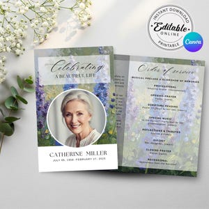 May include: A memorial card with a photo of a smiling woman, surrounded by a floral design in shades of purple and green. The text reads "Celebrating A Beautiful Life" and includes the woman's name and dates.