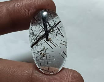 Aantrekkelijke zwarte rutielkwarts cabochon edelsteen in ovale vorm, geschikt voor het maken van sieraden, helende Reiki-steen en verzamelobjecten. Gewicht: 22 karaat. D#228