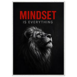 May include: Black and white print featuring a majestic lion looking upwards. The words "MINDSET IS EVERYTHING" are displayed in red and white text at the top of the image. The artwork is framed in a white border.