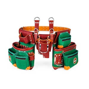 May include: A tool belt constructed from red and green leather, featuring multiple pouches, metal rivets, and silver-toned hardware. The belt includes two vertical straps with D-rings at the top and a circular logo patch on the right side pocket.