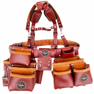 May include: A dark red leather tool belt with adjustable shoulder straps, multiple storage pouches, and metal rivets. The belt features circular black patches with the text HCL Heritage Craft Leather and a bull logo on the front pockets and center.