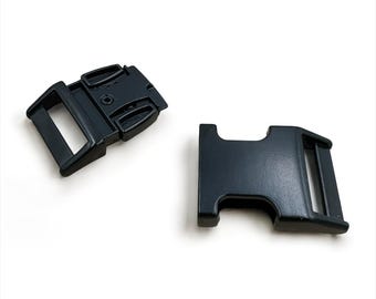 May include: Two black plastic side-release buckles. One has a male end with a release mechanism and a rectangular loop. The other has a female end with a rectangular loop.